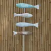  Product image 2 of the product “Stick with 4 colorful  direction signs in shape of fish with the words; Home, Beach, Beer and Surf. Made from wood, total height 150cm. ”
